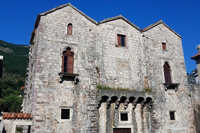 Bike tour - Kotor Bay circle and visit Our Lady of the Rock - Our Lady of the Rocks: choose the boat trip, then enjoy the island hour