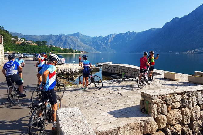Bike tour - Kotor Bay circle and visit Our Lady of the Rock - Church of Our Lady of Angels: that narrow bay view moment