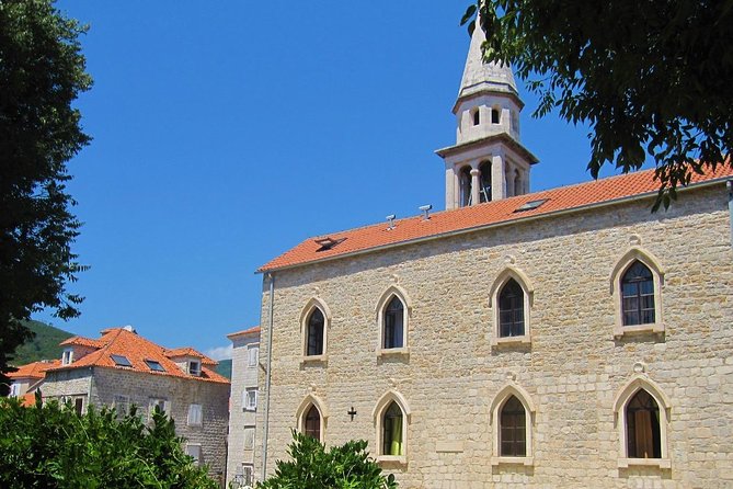 Budva City Tour - The main square, Saint John Cathedral, and the church cluster moment