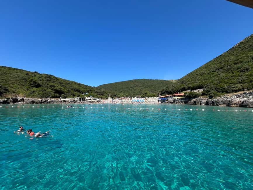 Deluxe excursion from Budva: Blue Cave tour - Trsteno Beach: sandy break between two capes