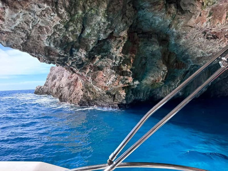 Kotor: Blue Cave Tour with Pickup and Free Drinks - Verige channel cruising: marinas, palace views, and WWII submarine tunnel vibes