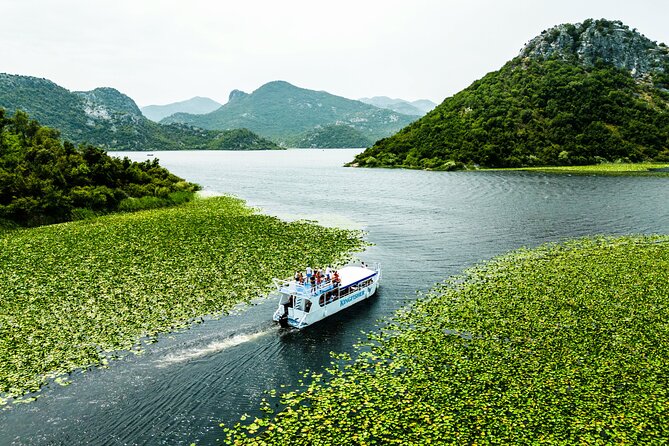 Skadar Lake & Crnojevića River: Swimming, Snacks & Wine - Gliding Down the River Canal Toward Vranjina Island