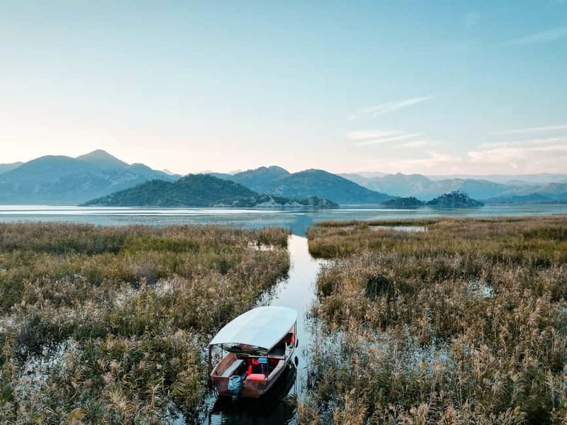 Skadar Lake: Guided Sunset Boat Tour with Wooden Boat & Wine - Wine and juice on board, what you are really paying for