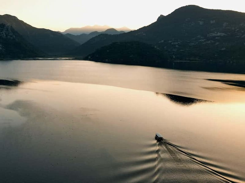 Skadar Lake: Guided Sunset Boat Tour with Wooden Boat & Wine - The gorice islands and channels with lotus, reeds, and long view time