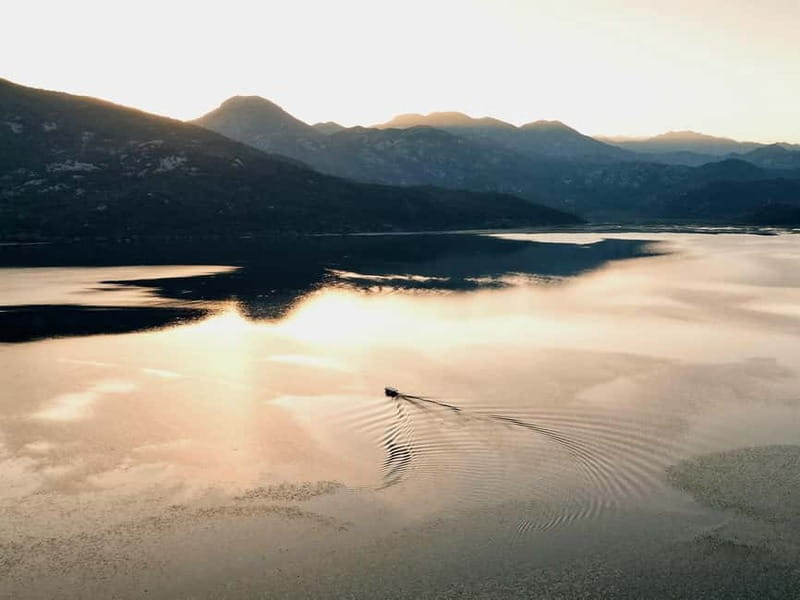 Skadar Lake: Guided Sunset Boat Tour with Wooden Boat & Wine - Swimming in Lake Skadar: fun, brief, and worth planning for