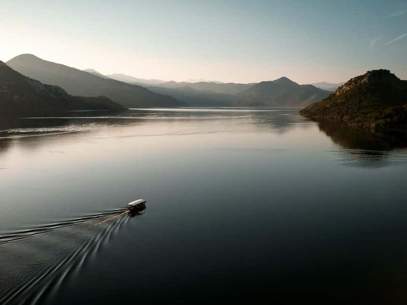 Skadar Lake: Guided Sunset Boat Tour with Wooden Boat & Wine - Price and logistics: $26 can be a bargain if you use what is included