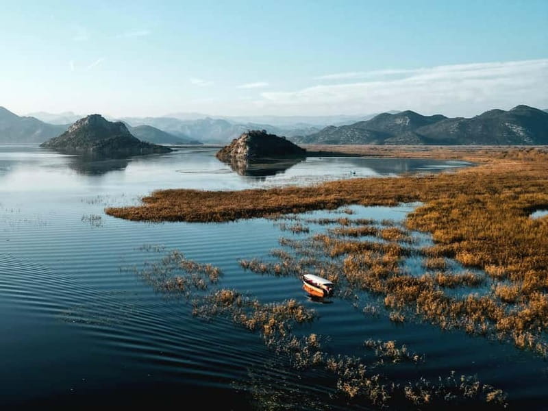 Skadar Lake: Guided Sunset Boat Tour with Wooden Boat & Wine - Who should book this Skadar sunset boat tour