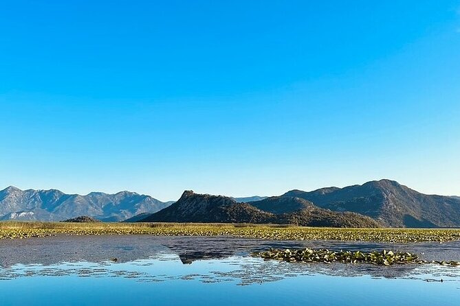 Skadar Lake National Park Boat Tour with Visit in Kom Monastery - Kom Monastery on the island: photos, lily canals, and 50 minutes to savor it