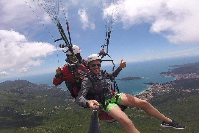 Tandem paragliding in Budva /All-inclusive - Stop 5: back in Budva, landing with the video in hand
